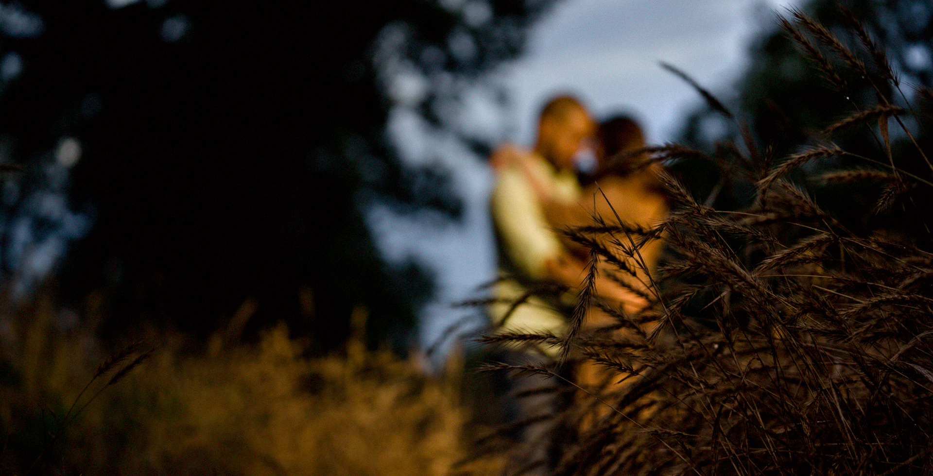 Couple kissing during engagement session at Texas' Hill Country, San Antonio